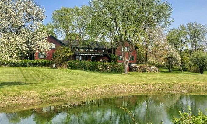 Brandon House | The Old Orchard Home surrounded by a small apple orchard, large meadows, and a private pond