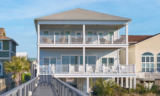 Ocean Isle Beach House | The Pineapple Beach Club, a Majestic Oceanfront Retreat, sleeps 36.