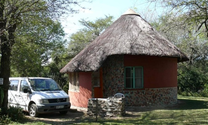 Thorny Bush Game Reserve House | The revamped riverside Kruger Park Type rondawel with Kitchen and Satellite TV