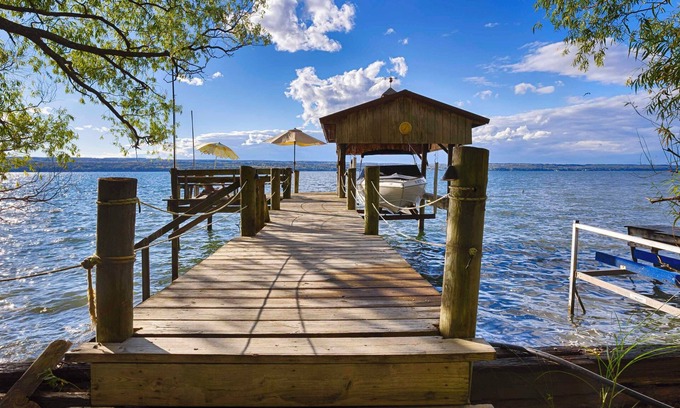 Lamoreaux Landing Cottage | The Willows:"Delightful Cottage with Peaceful Sunsets"