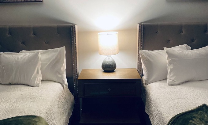 Wellston Bed & Breakfast | The Woods Suite #302 Free Arcade, Movie Theater, Patio Area, Playground and more
