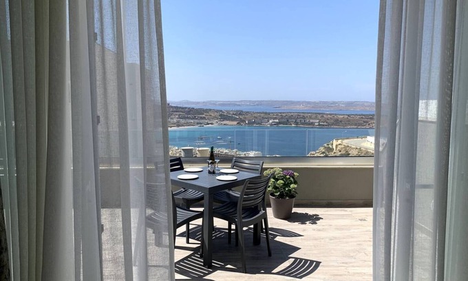 Mellieħa Heights Apartment | This modern refurnished apartment is a self-catering accommodation located Mellieha. Perfectly located in a quit area of Mellieha but surrounded with all amenities, the bus stop is just five minutes walk from the apartment, from this bus term