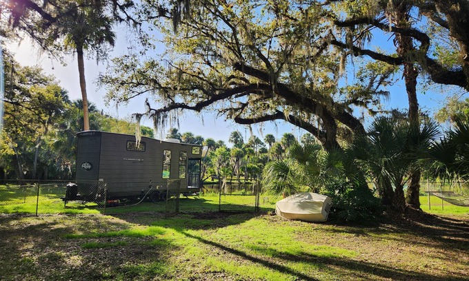 Fort Pierce House | Tiny home next to private pond on 1.75 acre fenced in homestead property.