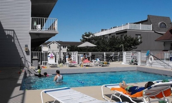 North End Condo | Top Floor - Elevator, 2 Bed,1 Bath, 1 Block to Beach, POOL!