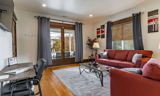 Central City Apartment | Top Floor Fast Internet Huge Patio Near Downtown