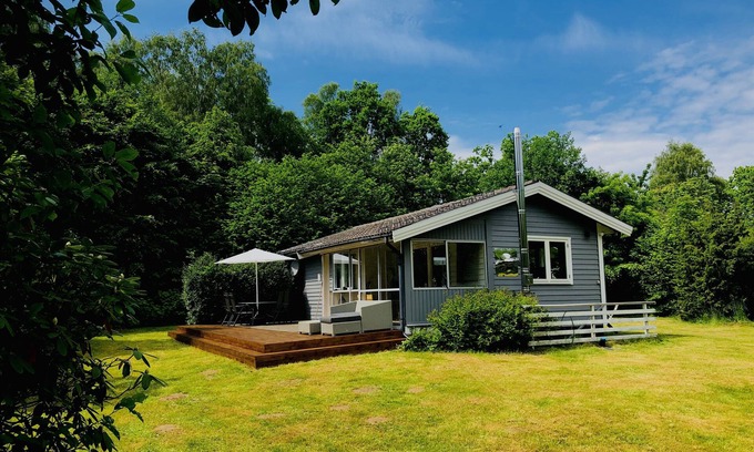 Laholm House | TOP holiday home at Laholm/Mellbystrand with sun terrace, fireplace + conservatory