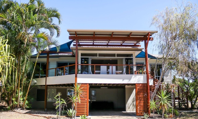 Urangan House | Top Tier Modern split level, pet-friendly family holiday home on the Esplanade with dog-friendly