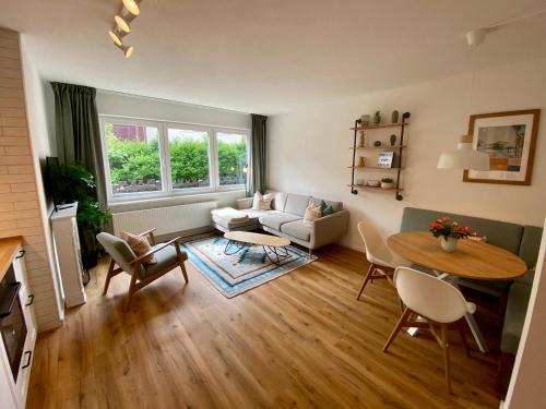 Braunlage House | Townhouse am Kurpark - Familienfreundliches Ferienhaus mit Retro-Arcade, Wallbox & privatem Eingang