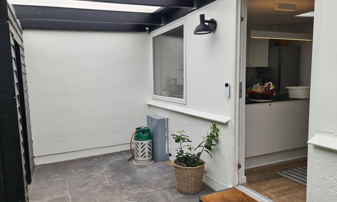 Naesby Condo | Townhouse with wooden terrace