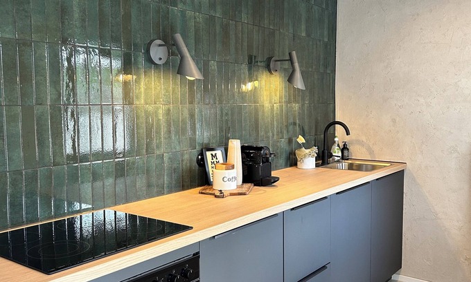 Losheim am See Apartment | TownHouse Zentral in Losheim und dennoch ruhig. Mit Bachlauf im Garten.