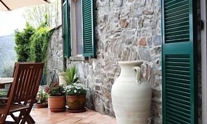 Tresana Villa | Traditional stone villa with terrace & gardens, in the hills of Lunigiana, Northern Tuscany.