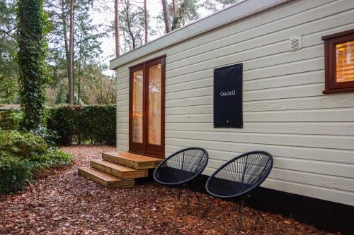 Municipality of Elburg Ski Chalet | Tranquil forest chalet by a pond in Veluwe, sleeps 4