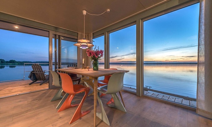 Uecker-Randow Boat Rental | traumHaff houseboat La Péniche/Baltic Sea - design, sunset & sauna on board