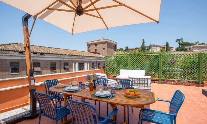 Ripa Apartment | TreasureRome Rooftop Terrace Over Arch of Janus 2BR Duplex