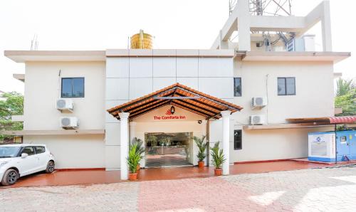 Adyar Hotel | Treebo Comforts Inn, University Road Deralakatte