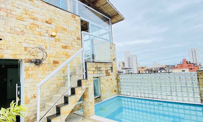 Jardim Ana Maria Apartment | Triplex in Enseada with private pool