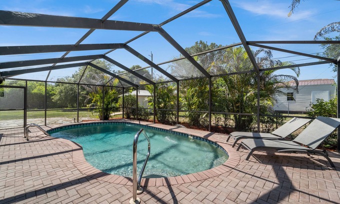 Port Charlotte - Charlotte Harbor House | Tropical Palm Oasis - Cozy Private Heated Pool Home!