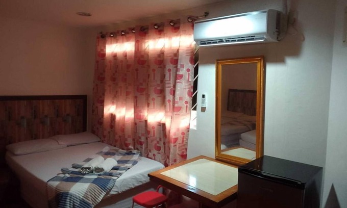 Puerto Princesa City Centre Apartment | Tropical Retreat: Palawan Studio