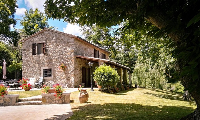 Arcidosso Villa | Tuscan stone villa with private pool surrounded by greenery