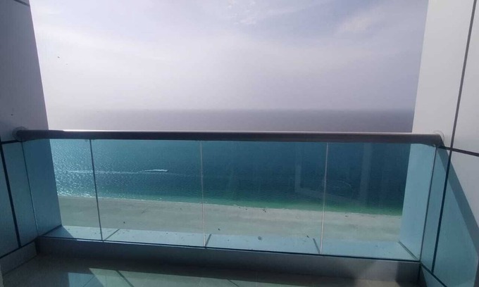 Rumailah Apartment | Two-bedroom hotel apartment with a living room and a sea view, VIP