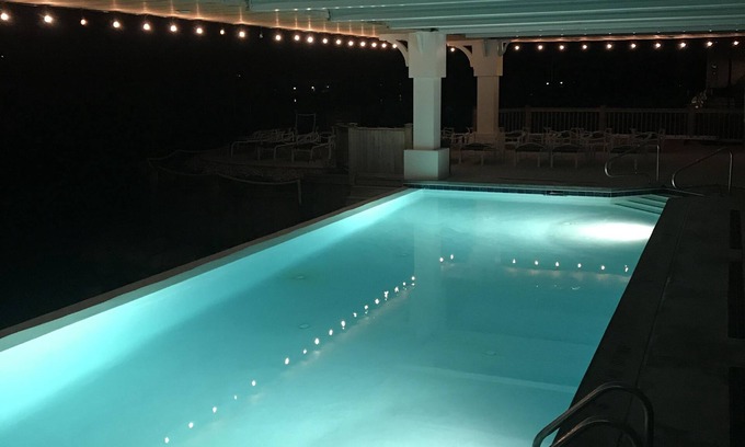 Onekama Condo | Two Lakes & Pool! 1st Floor Condo on Portage Lake and Steps from Lake Michigan