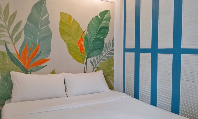 Guadalupe Apartment | Two separate studio units on the same floor of a midrise condominium building.