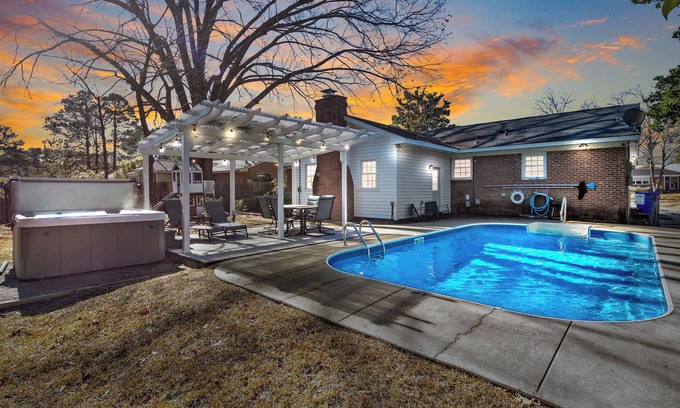 Terry Sanford House | Ultimate Family Getaway: Private Pool & Hot Tub, Game Rooms & Playground
