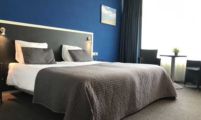 Renesse Hotel | Unwind in Cozy Haven w/Onsite Dining, Parking near Seaside Escape & Local sites