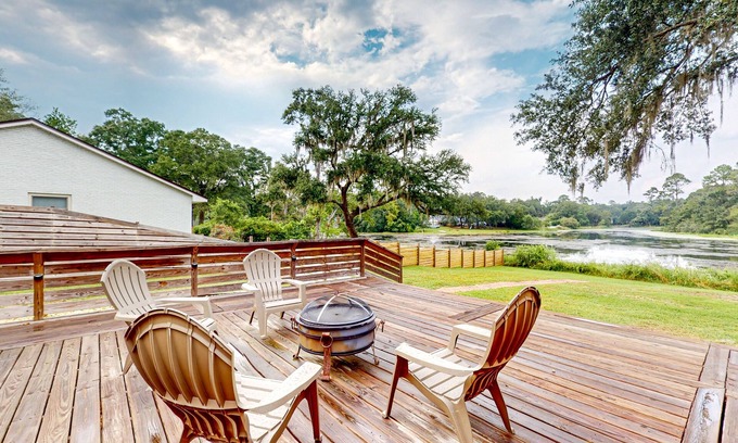 Milton House | Updated waterfront home with spacious outdoor living area, gaming room