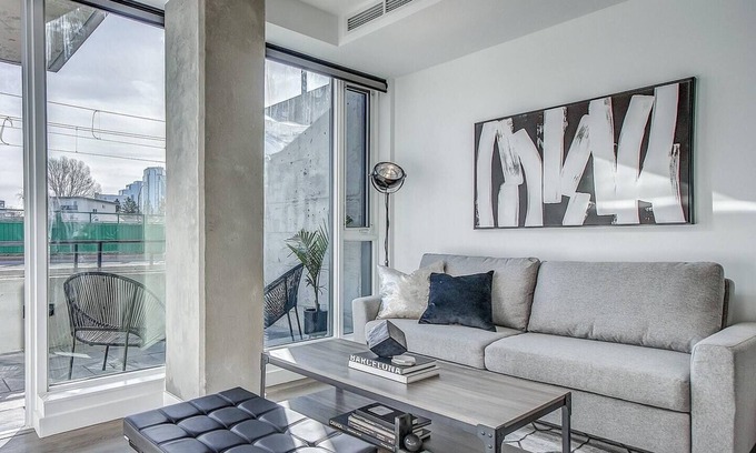 Sunnyside Condo | Upscale Industrial Condo with Patio near LRT