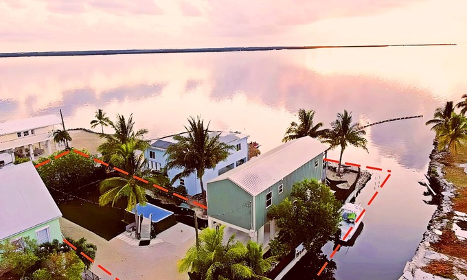 Sands House | Upscale ocean front home & easy canal boat access to Gulf or Atlantic