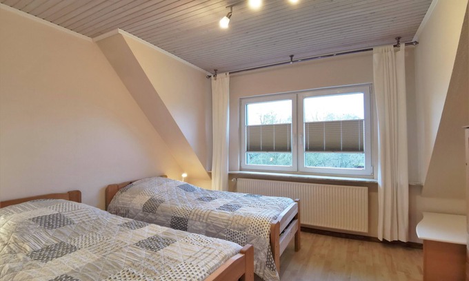 Oeversee Apartment | Vacation apartment upstairs - Ischmund: Cozy vacation apartment in the far north
