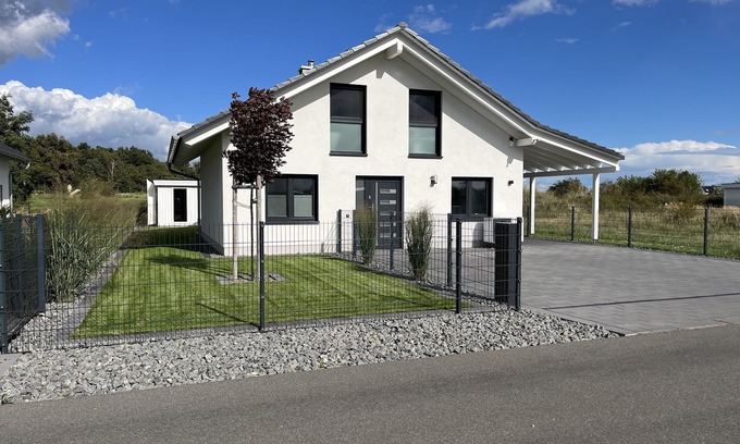 Lobnitz House | Vacation home Hilde on the lake with private beach for 4 adults, fireplace, boat and sauna