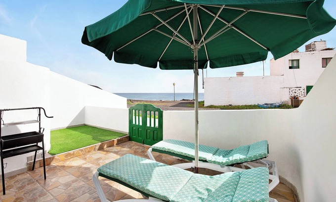 Pozo Negro House | Vacation Home "Mar de Lava Sunrise Fuerteventura" with Sea View, Terrace & Wi-Fi