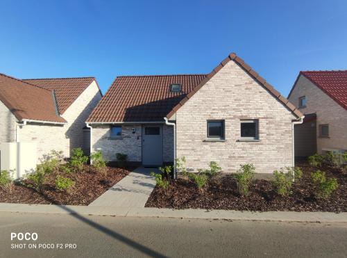 Koksijde House | Vakantiewoning Polderhuis 10, airco en verwarming in alle kamers, privé parkeerplaats en afgesloten tuin