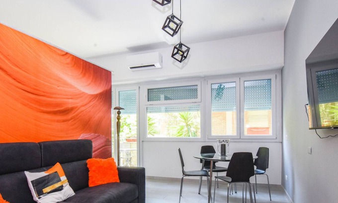 Ostiense Apartment | Vibrantly colored apartment on Salvatore Pincherle Street for 4 to four ospi