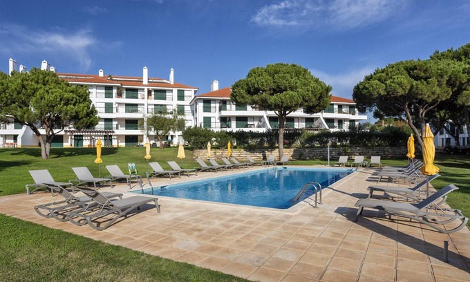 Quarteira Apartment | Vila Sol: Nice apartment with large south-facing terrace and view of own park