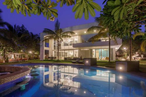 Alibaug Villa | Villa Capri by StayVista - Featuring a swimming pool, mountain view and snooker table