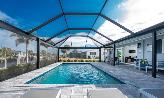 Punta Gorda House | Villa Capri | Waterfront Luxury Retreat Heated Saltwater Pool Dock