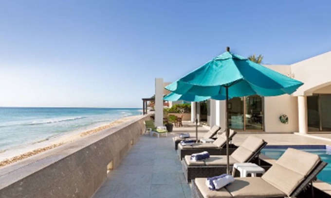 Playacar Beach Villa | Villa El Dorado is a chic contemporary oceanfront private oasis