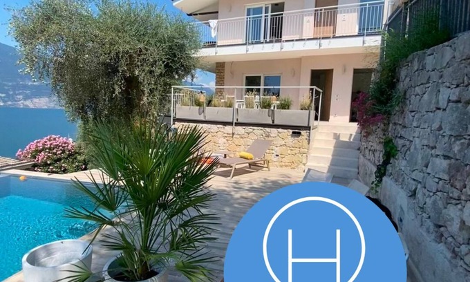 Brenzone sul Garda Apartment | Villa Holzi: Modern apartment with Infinity pool and stunning lakeview