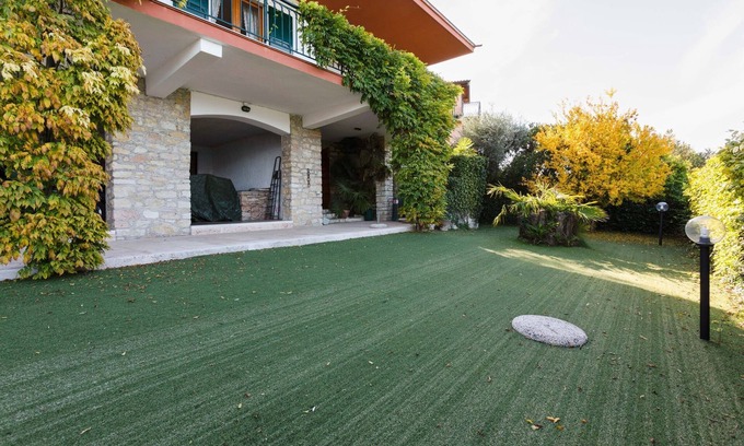 Torri del Benaco Villa | Villa in Torri with Pool & Mountain Views
