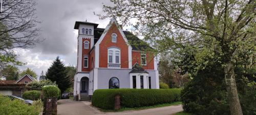 Drangstedt Apartment | Villa Kunterbunt, Gemütlichkeit am Waldesrand