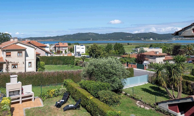 Quintans Villa | Villa La Lanzada (207), with garden and sea views