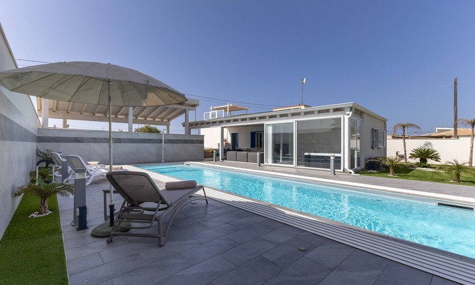 Santa Maria del Focallo Villa | Villa 'Maria Con Piscina Riscaldata' with Sea View, Wi-Fi and Air Conditioning