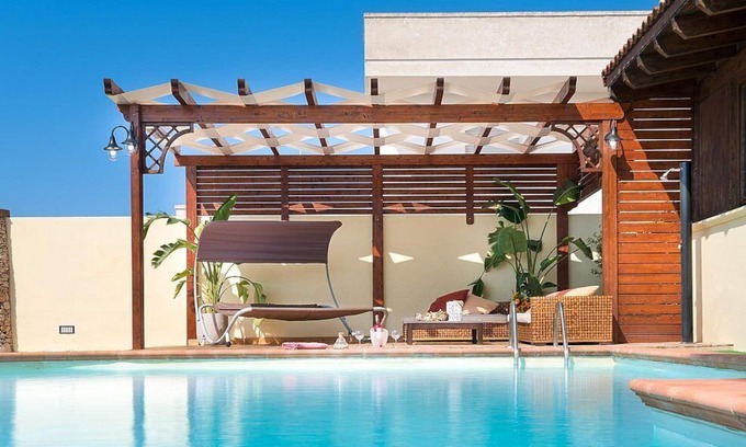 Marina di Mancaversa Villa | Villa Plutone: A cozy and welcoming villa situated in a quiet location, surrounded by a wonderful garden, with Free WI-FI.