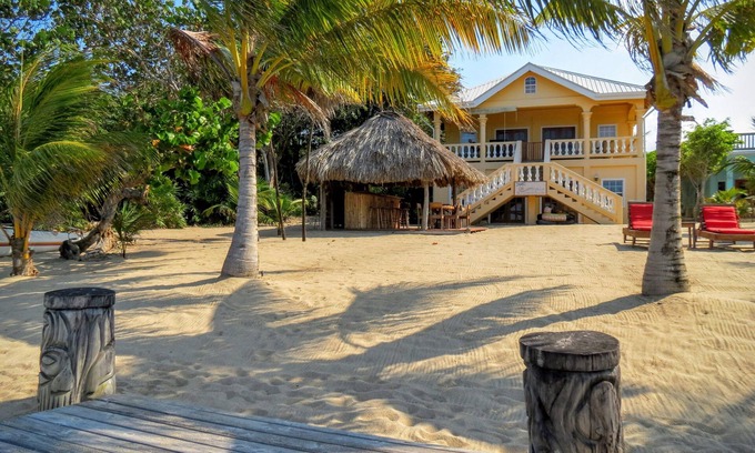 Sittee River Village Villa | Villa Rising Sun Beachfront with Private Beach Bar & Dock
