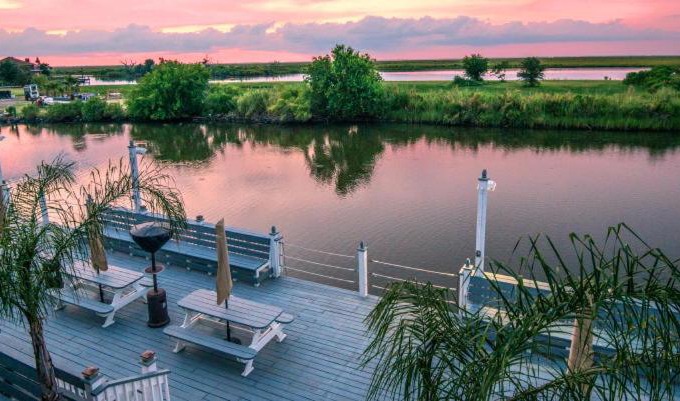 New Orleans East Area Villa | Villa with Waterfront Deck 23 Mi to Bourbon Street!