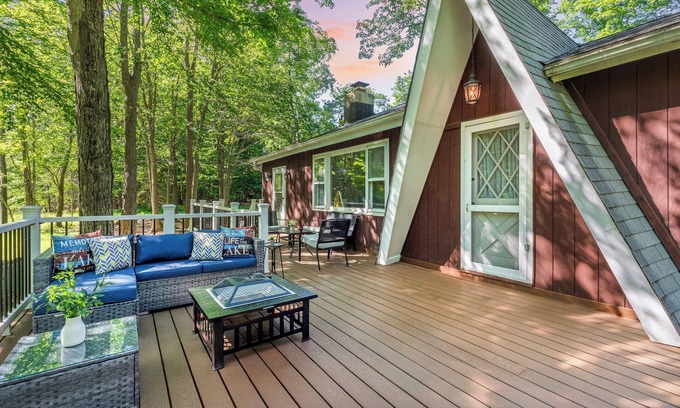 Pocono Lake House | Walk to the Lake | Firepit, Deck, Sunroom, Fireplace | Tomhickon by AvantStay