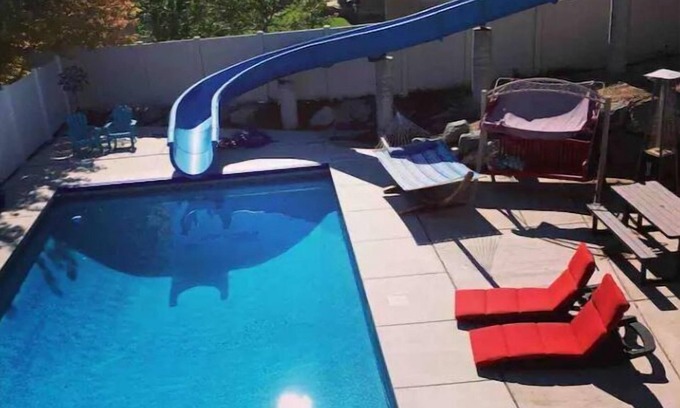 South Jordan Apartment | Walkout Basement Apt w/Waterslide, Hot Tub & Moren